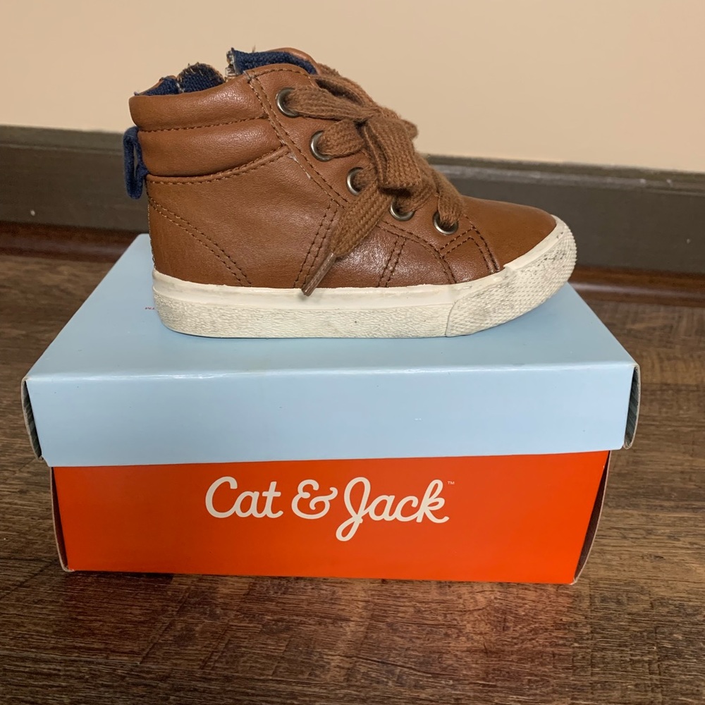 Brown toddler shoe worn